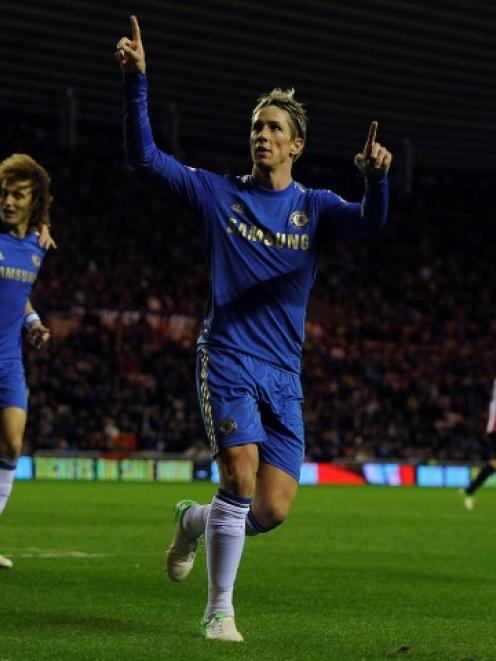 Chelsea's Fernando Torres (2nd L) celebrates scoring a penalty against Sunderland during their...