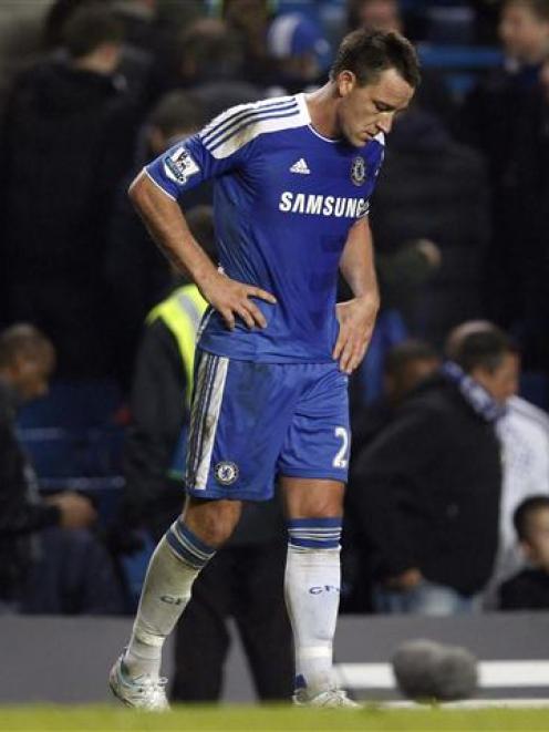 Chelsea's John Terry reacts after the loss. REUTERS/Eddie Keogh