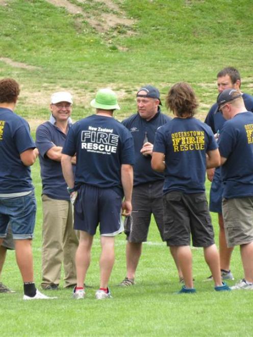 Chief fire officer Terry O'Connell, wearing a white cap, and the Queenstown Volunteer Fire...