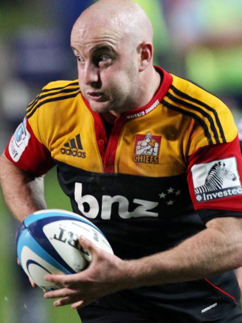 Chiefs halfback Brendon Leonard runs the ball against the Stormers. Credit:NZPA / David Rowland.