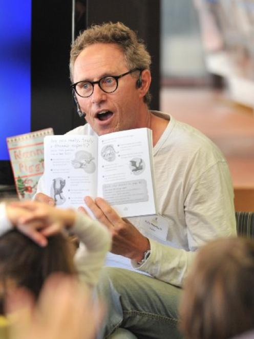 Children’s book author Kyle Mewburn reads one of his stories at the Dunedin Public Library. Photo...