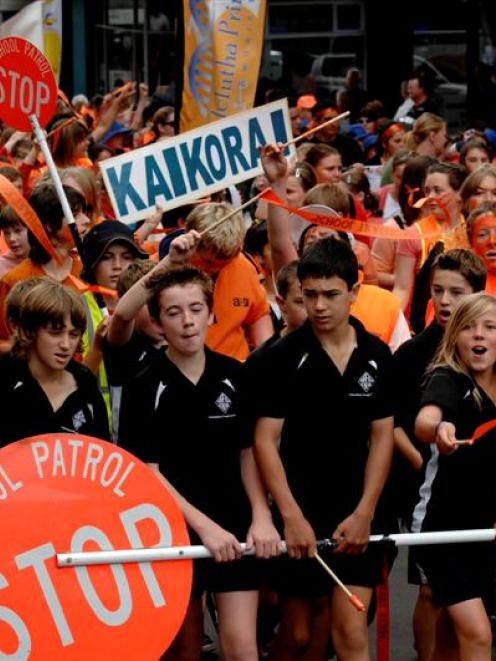 Children from around Otago take part in the school road patrollers annual Orange Parade along...
