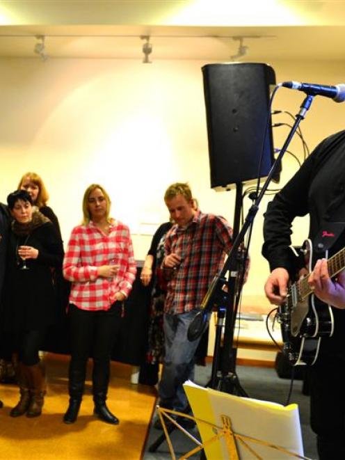 Chill's frontman Martin Phillipps performs at the Somewhere Beautiful album launch at the Hocken...