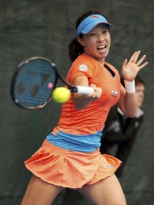 China's Zheng Jie plays a shot on her way to beating Italy's Flavia Pennetta during the singles...