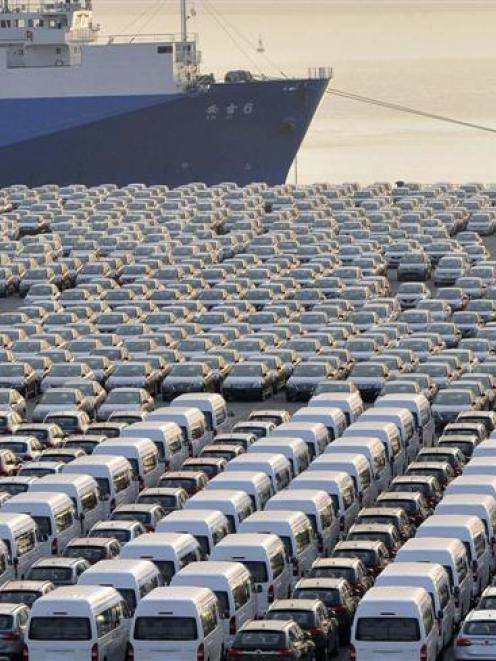 Chinese cars wait to be exported at a port in Dalian, Liaoning province. Photo by Reuters.