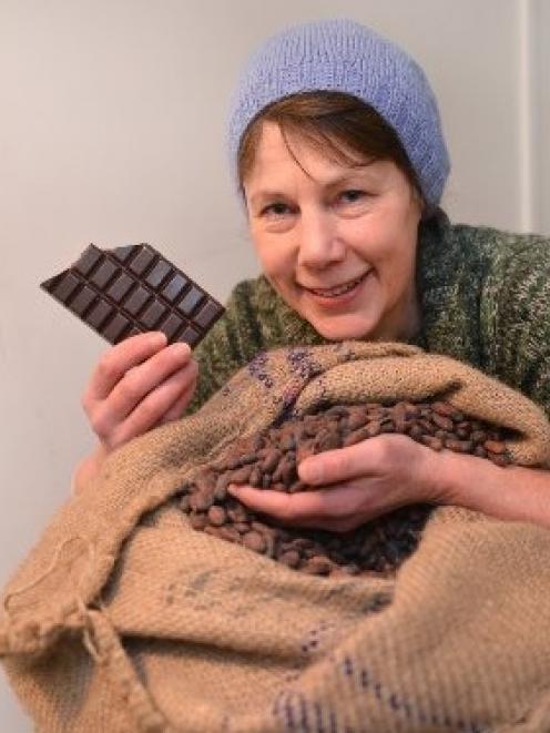 Chocolate-maker Liz Rowe with a block of her Ocho chocolate, made from Papua New Guinea cocoa...