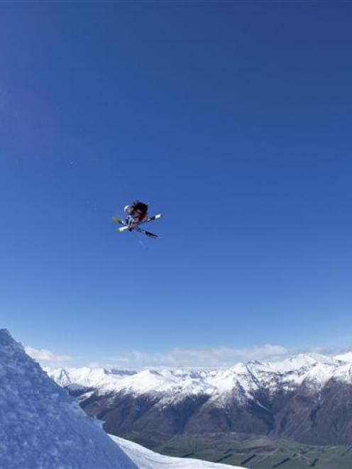 Chris Booth (Australia) flies into second place on the freeride day at the World Heli Challenge....