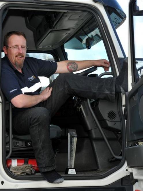 Chris Foot enjoys being back in his truck after visiting the Volvo factory in Sweden. Photo by...
