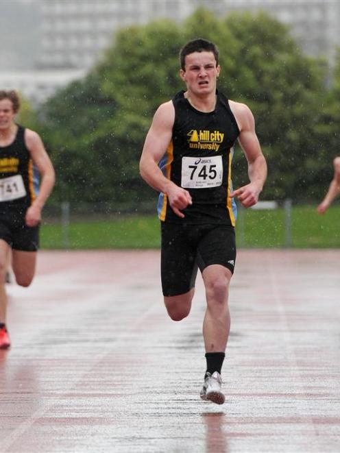Chris McNoe wins the men's 400m at the Caledonian Ground on Saturday, ahead of fellow Hill City...