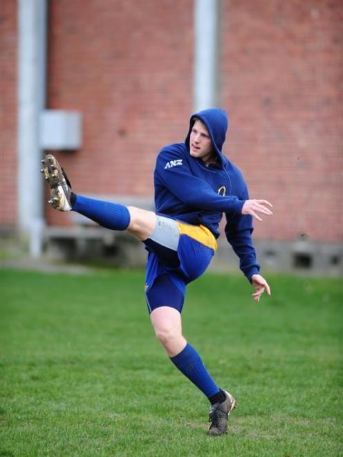 Chris Noakes practises his kicking at Otago training yesterday. Photo by Craig Baxter.