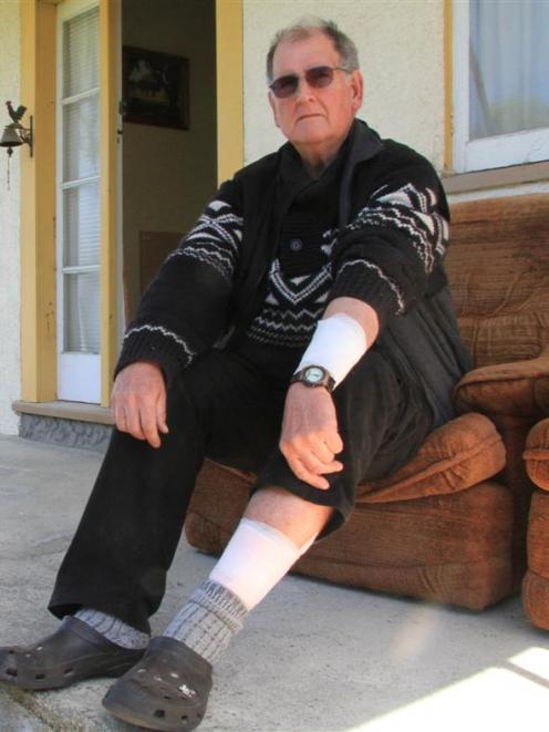 Chris Watson rests at his Palmerston home. Photo by Hamish MacLean.