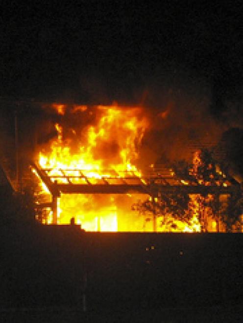 Fire at the house on the corner of Wainoni Rd and Hampshire Street where the bodies of Tisha...