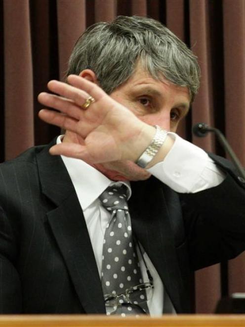 Christchurch-based pathologist Dr Martin Sage gives evidence yesterday in the High Court trial of...