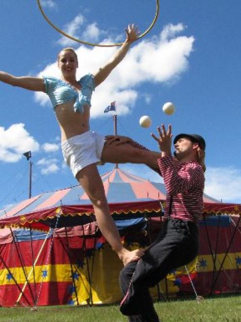 Circus Aotearoa performers Olivia Watts (20) and Pascal Haering (33) demonstrate their skills at...