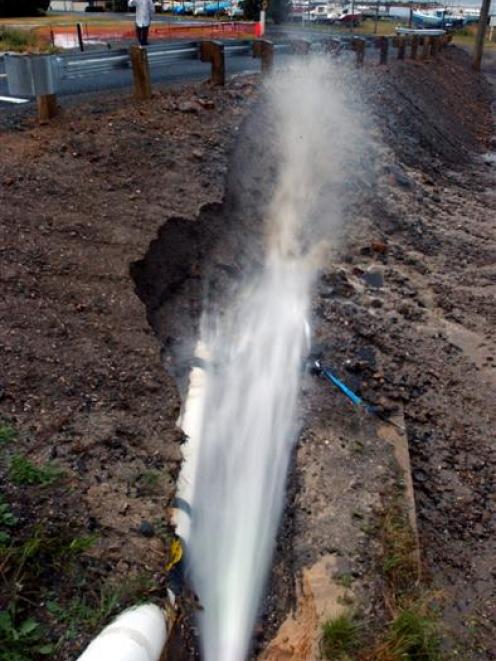 Burst water main in Magnet Street on Sunday night. Photo by Craig Baxter.