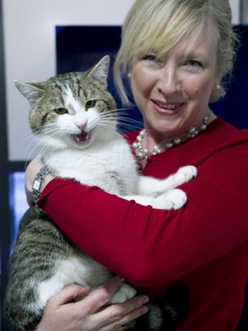 Claire Horton, CEO of Battersea Dogs and Cats Home in London, holds Larry before he is taken to...