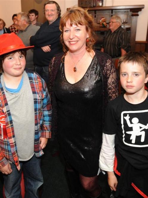 Clare Curran with sons Callum (left) and Riley on Saturday night. Photo by Craig Baxter.