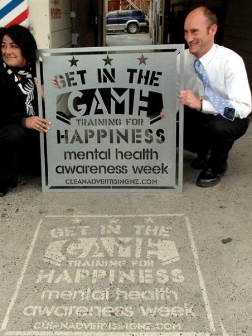 Clean Advertising NZ owners Jo Cook and Chris Wesley get their message across in Dunedin...