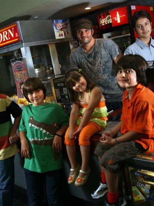 Clockwise from top: Film-maker Robert Rodriguez with his children Rocket, Rogue, Rhiannon, Rebel...