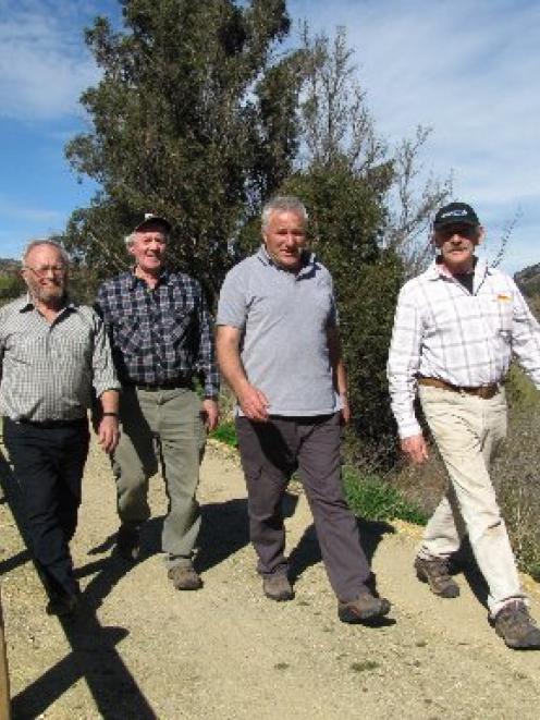 Clutha Gold Trail Charitable Trust members (from left) Stu Edgecumbe, of Roxburgh East, chairman...