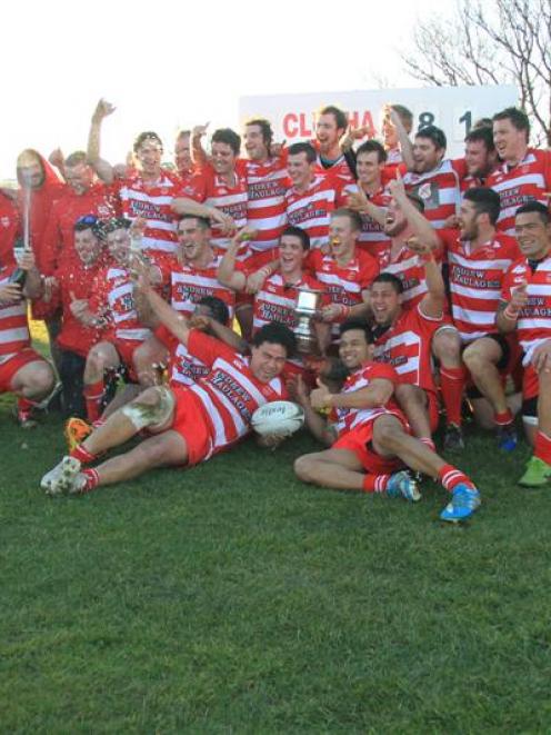Clutha players celebrate after they beat Heriot 81 12 in the South Otago premier club final in...
