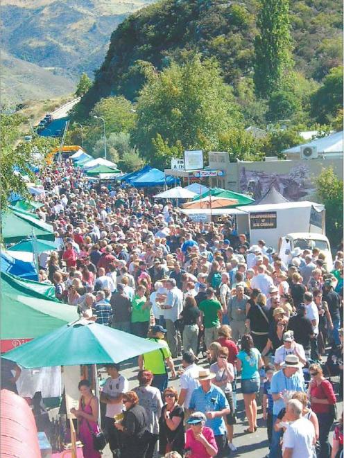 Bustling bargain-hunters . . . Clyde's 2008 Easter Wine and Food Festival attracted a record...