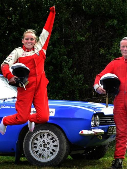 Co-driver Nikita Gibson shows her enthusiasm for rally-car racing as she and  stepfather Tony...