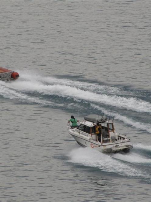 Coastguard Queenstown and a private fishing charter boat sweep Sunshine Bay as part of the search...