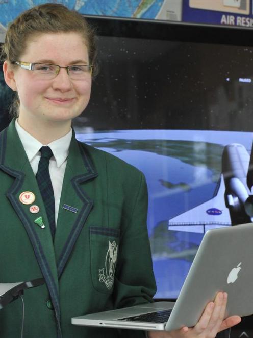 Columba College pupil Ailsa Carroll puts in some hours on the space shuttle flight simulator in...