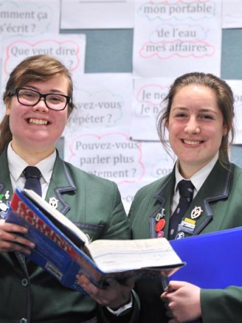 Columba College pupils Ailish Wallace-Buckland (left) and Emily Willis have won the 2014...