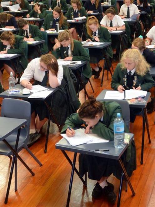 Columba College pupils take a school examination last week. Photo by Stephen Jaquiery.