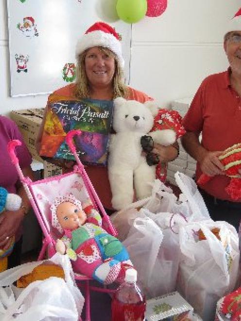 Combined Christmas Food Bank co-ordinator Rosalie Littlejohn (left), Presbyterian Support Family...
