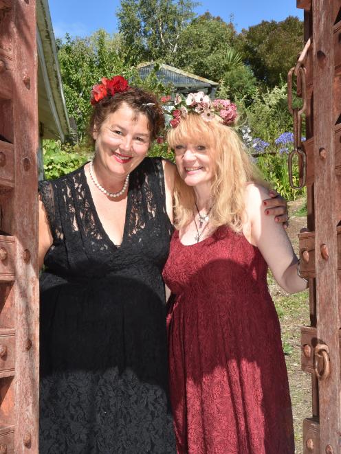 Actors Sarah McDougall (left) and Elsa May at the entrance of the McDougall's back garden in...