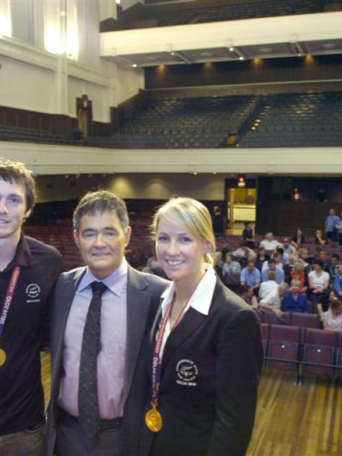 Commonwealth Games gold medallists Ben Smith (left) and Alison Shanks with mayor Dave Cull at a...
