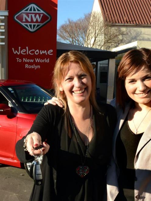 Competition winner Kaye Baldwin savours the moment  with daughter Jaala (20) after being given...