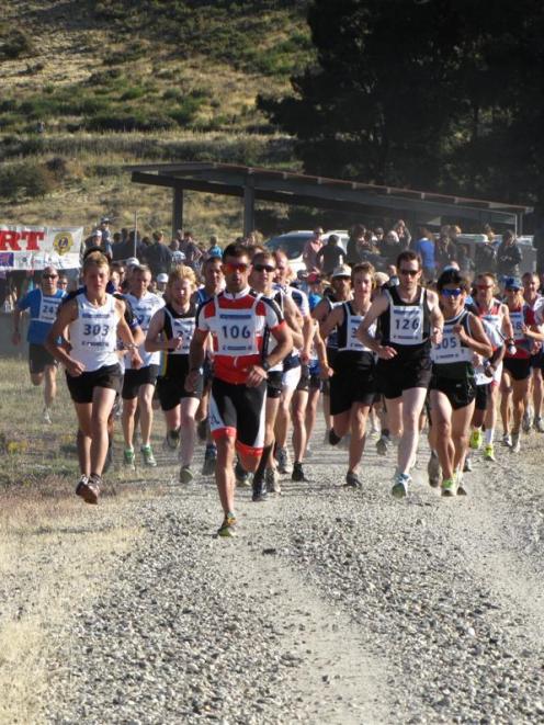 Competitors set off from Clyde at the start of the Otago Central Rail Trail Duathlon. Photo by ODT.