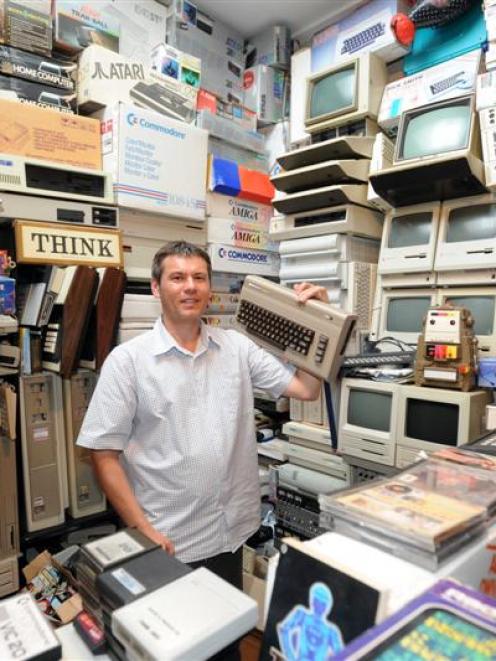 Computer enthusiast Clinton Rowe in one of the several rooms used in his Dunedin home to house...