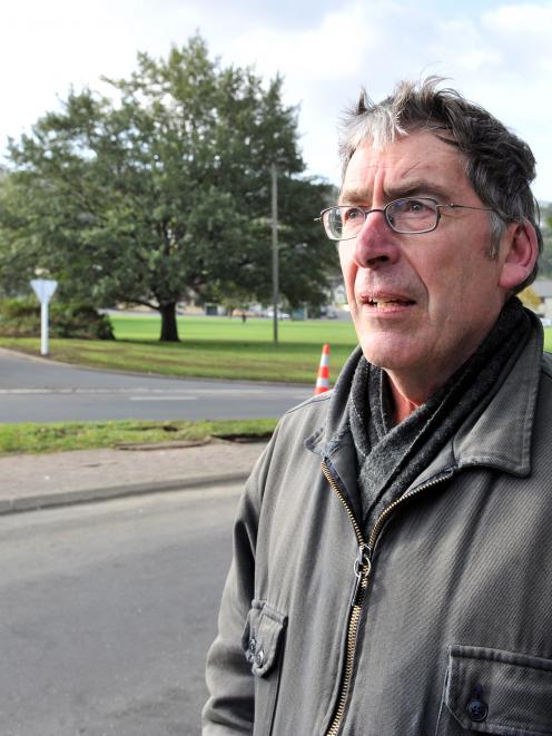 Concerned resident Paul Sorrell at the site of Tuesday's truck crash at the bottom of Pine Hill...