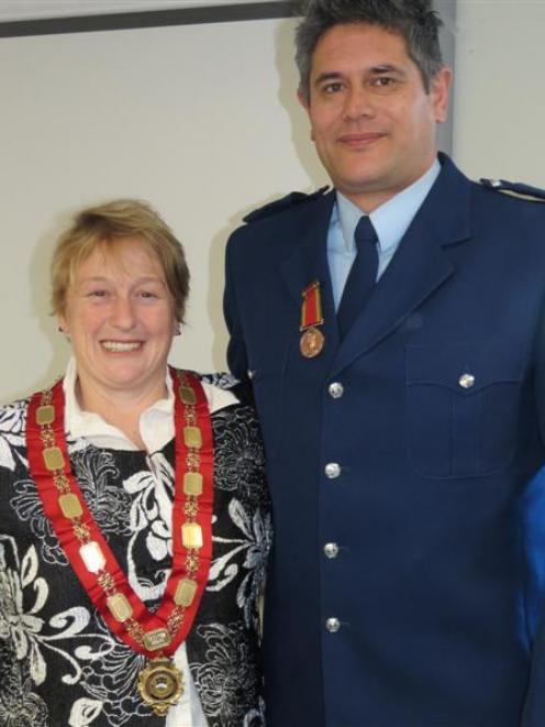 Constable Aaron Redaelli, of Queenstown, was presented with the Bronze Medal for bravery by...
