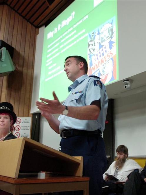 Constable Julian Real speaks against the decriminalisation of marijuana as (from left) Mandy...