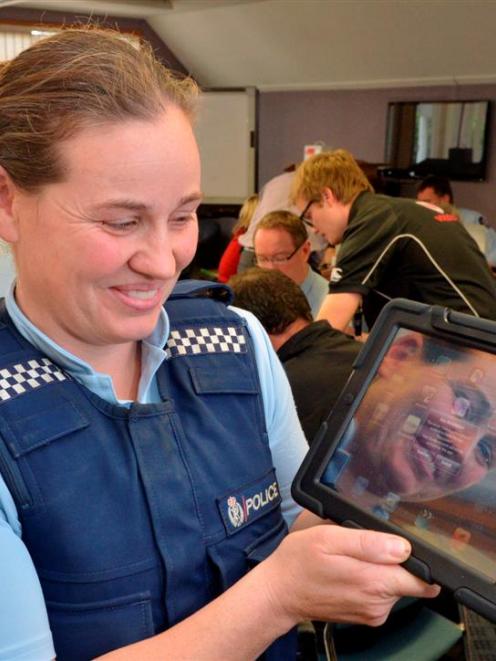 Constable Lesley Eason, of Waikouaiti, takes hold of her latest crime-fighting tool, an iPad, at...