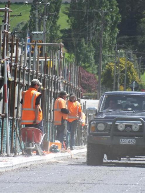 Contractors carry out structural inspections at the 123-year-old Beaumont Bridge crossing of...