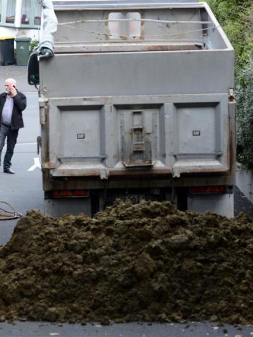 Contractors prepare to clean up  excrement dumped outside the Otago Regional Council's Dunedin...