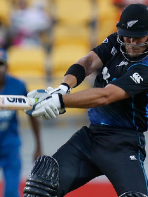 Corey Anderson playing for New Zealand.