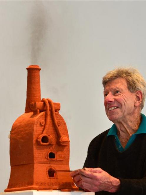 Coromandel potter Barry Brickell fires up one of his terracotta creations in his 'A Hot Retort'...