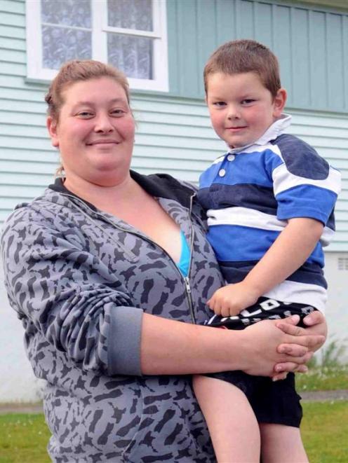 Corstorphine resident Esme Helm (28), with son Tyler Lee (4), says Mongrel Mob members have been...