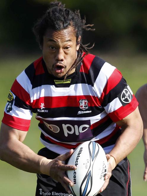 Counties Manukau's Tana Umaga runs the ball at North Harbour's Ken Pisi during an ITM Cup rugby...