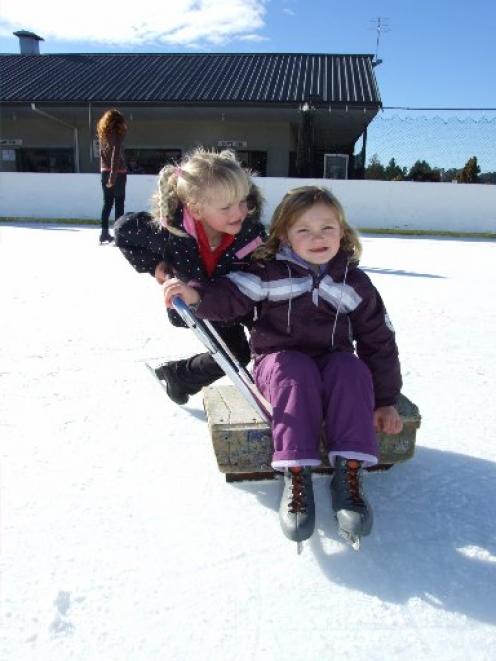 Cousins Inge Kemp,  of Christchurch (left), and Nia Du Plessis (5), of Omakau, enjoy the sun on...