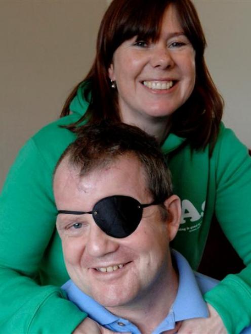 Crash survivor Mark Halliwell and his partner Anna Morgan before leaving Dunedin yesterday. Photo...