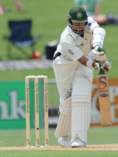 Pakistan's Fiasal Iqbal crosses up against New Zealand